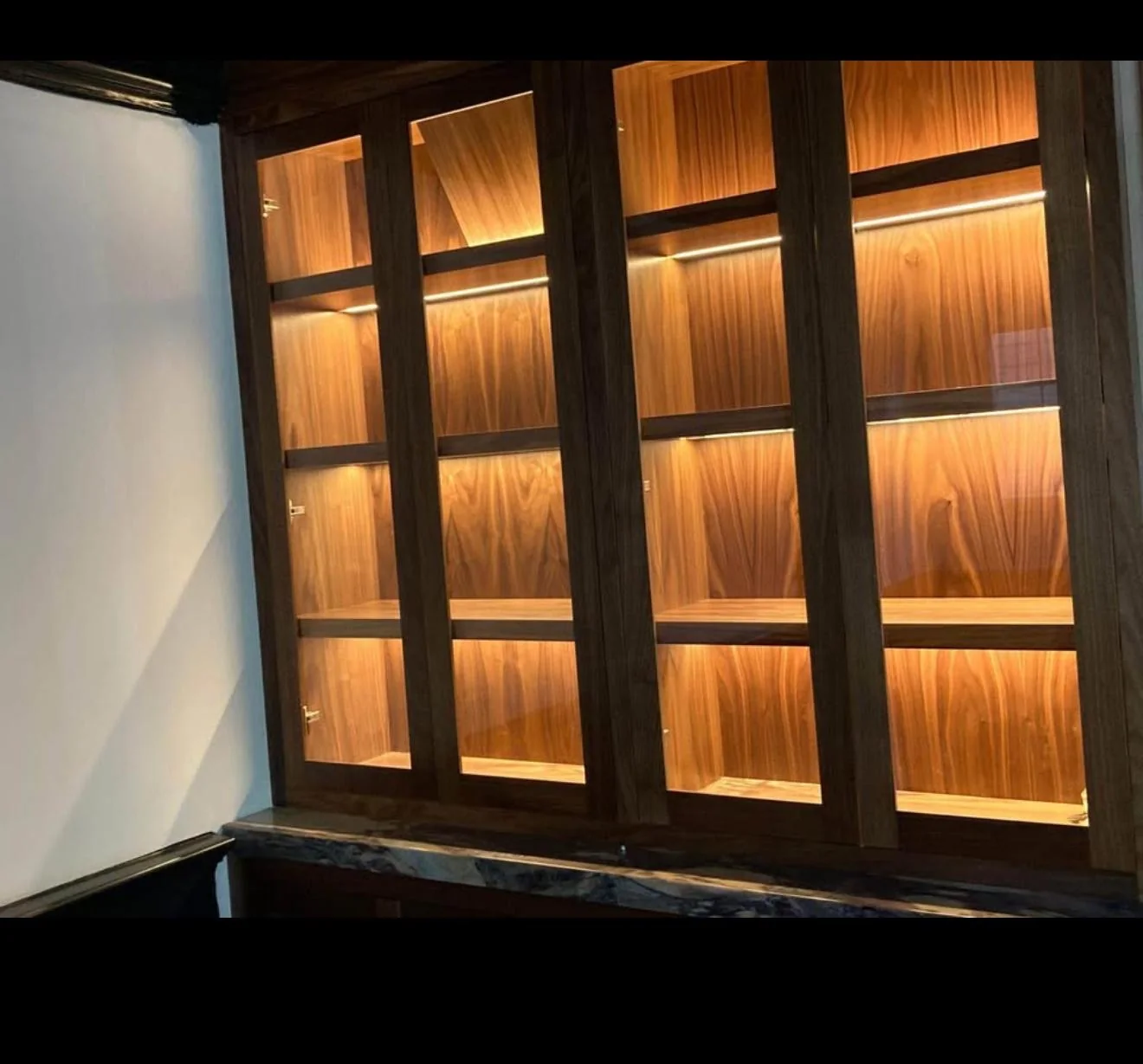 Custom illuminated cabinetry